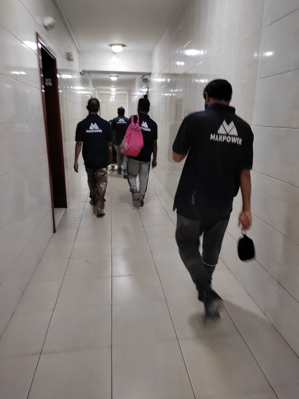 MaxPower team in hallway
