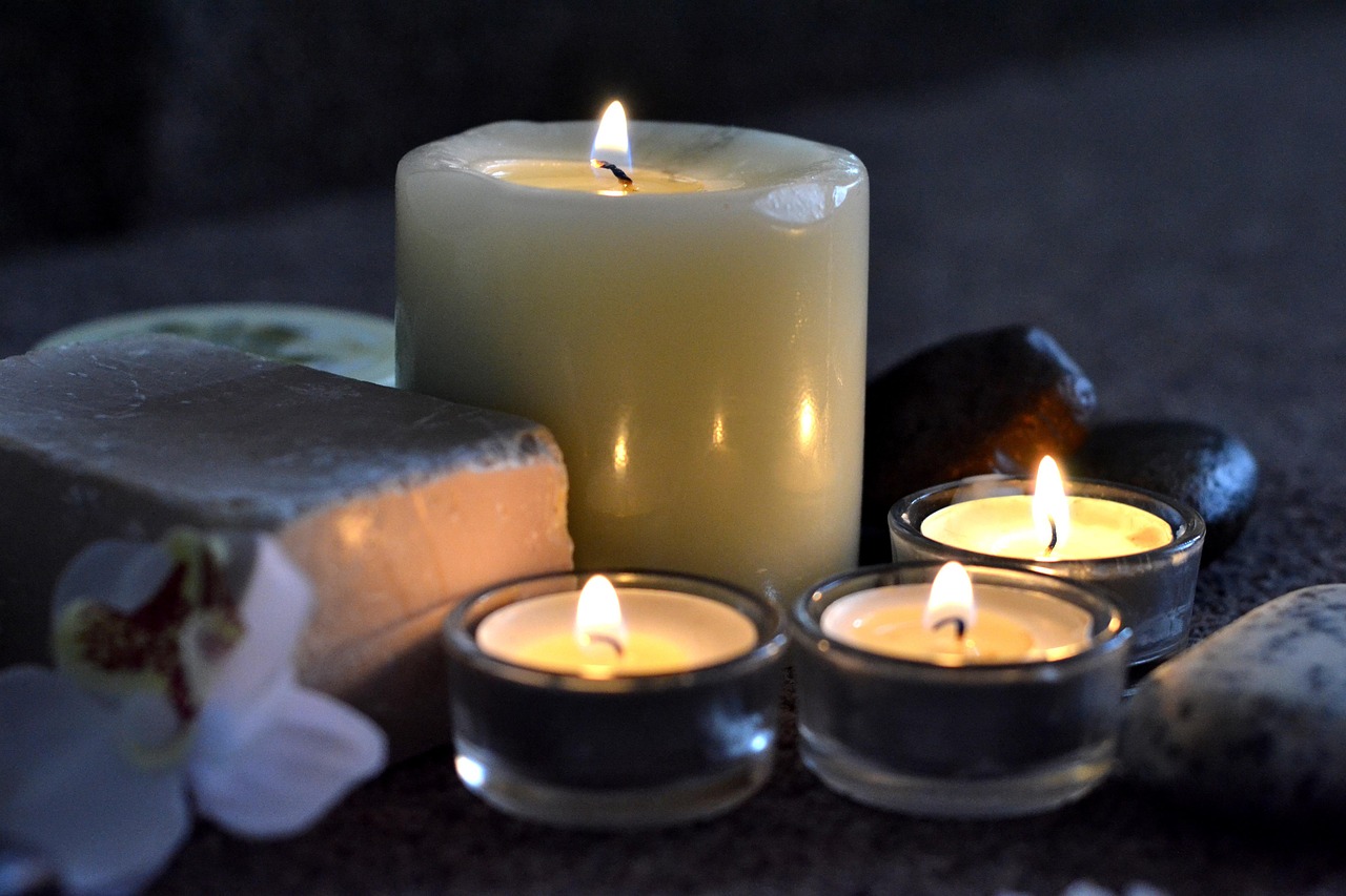 Spa candles creating a relaxing atmosphere