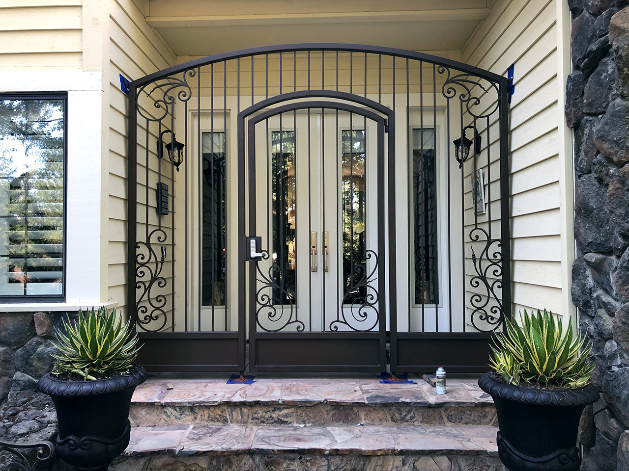 Custom decorative iron door and railing