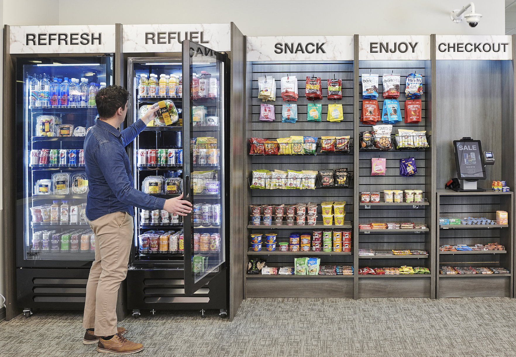 Modern micro market with vending machines and snack displays