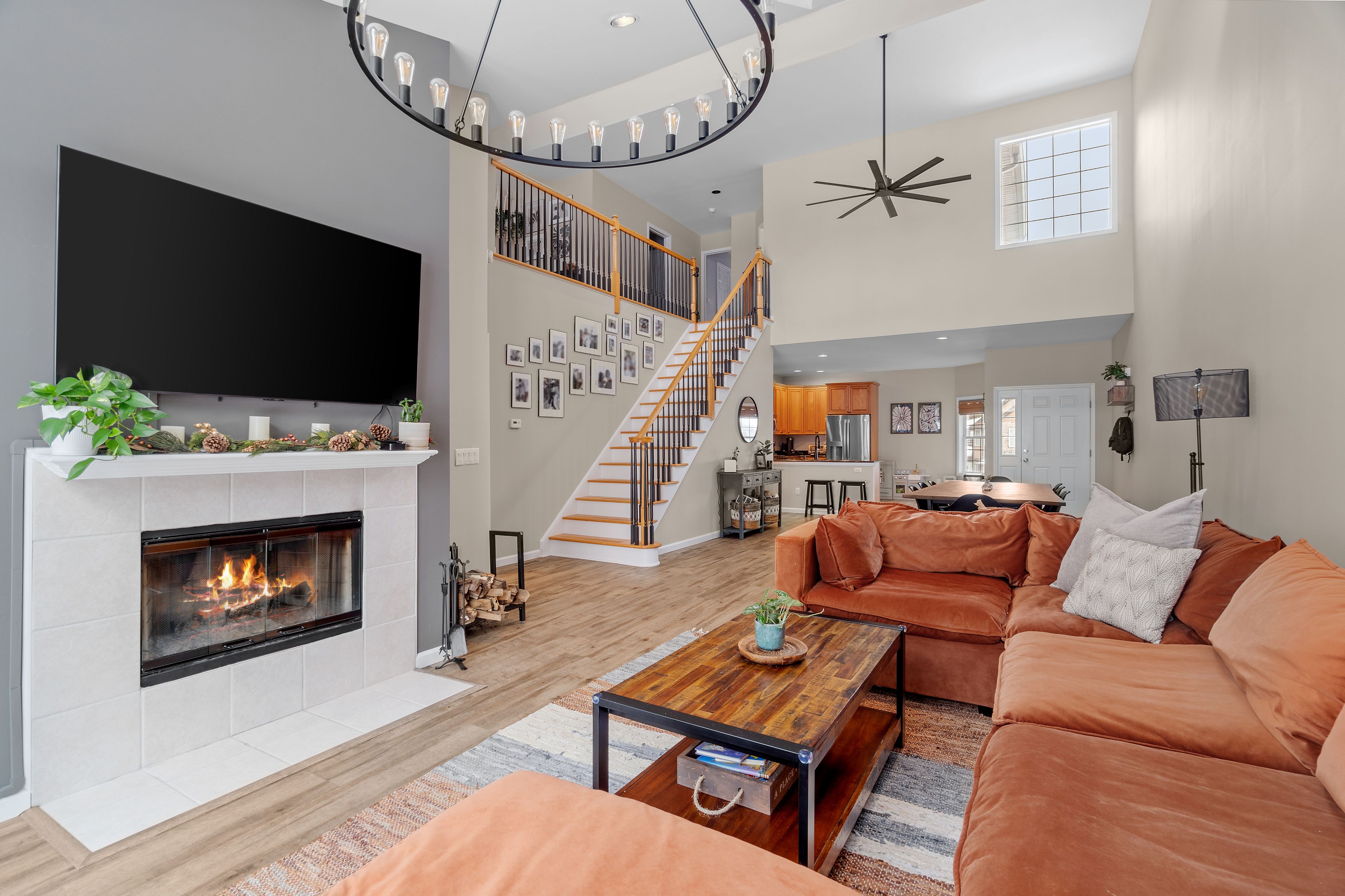Modern living room with fireplace and staircase