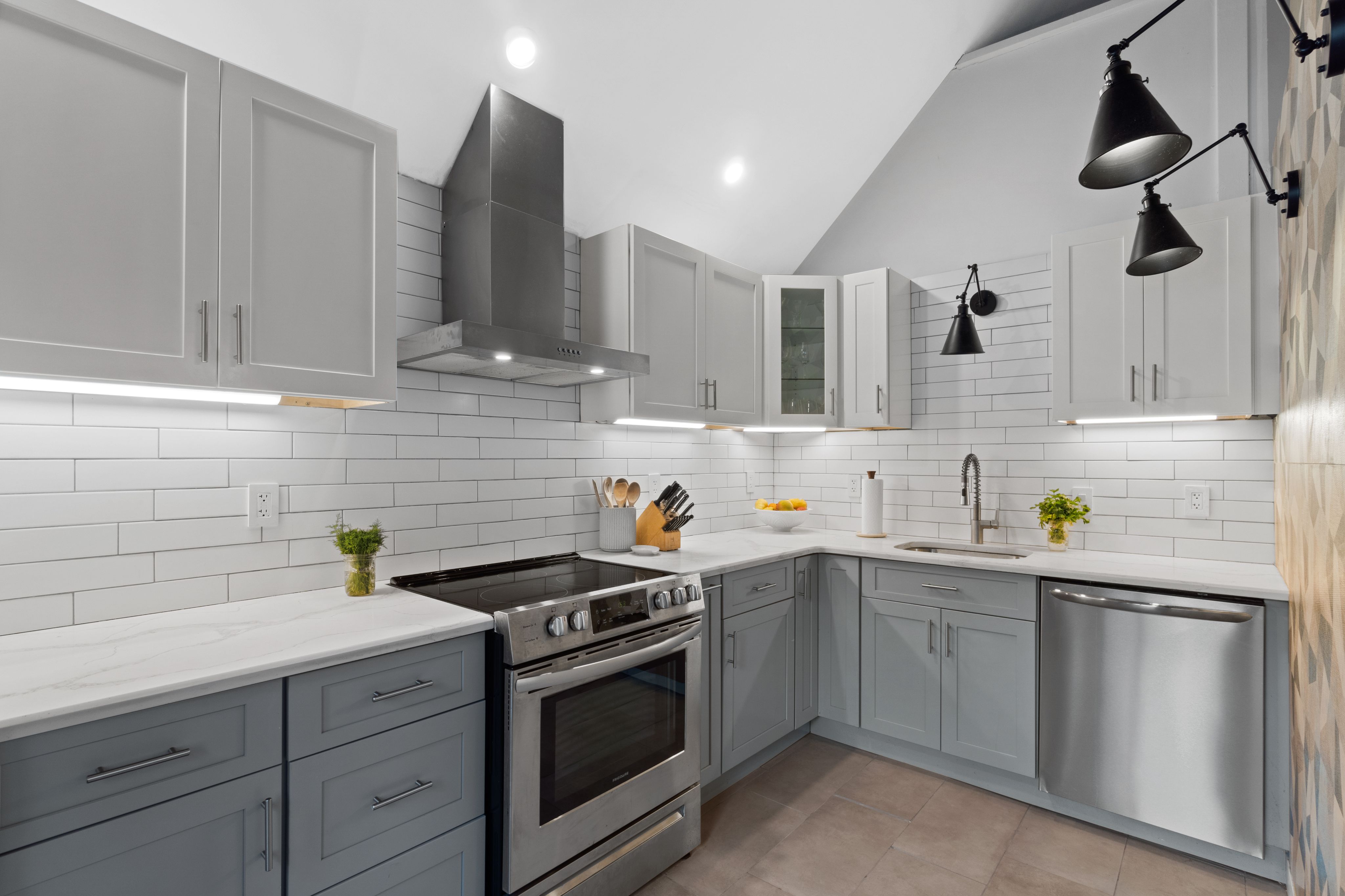 Modern kitchen with gray and white cabinets