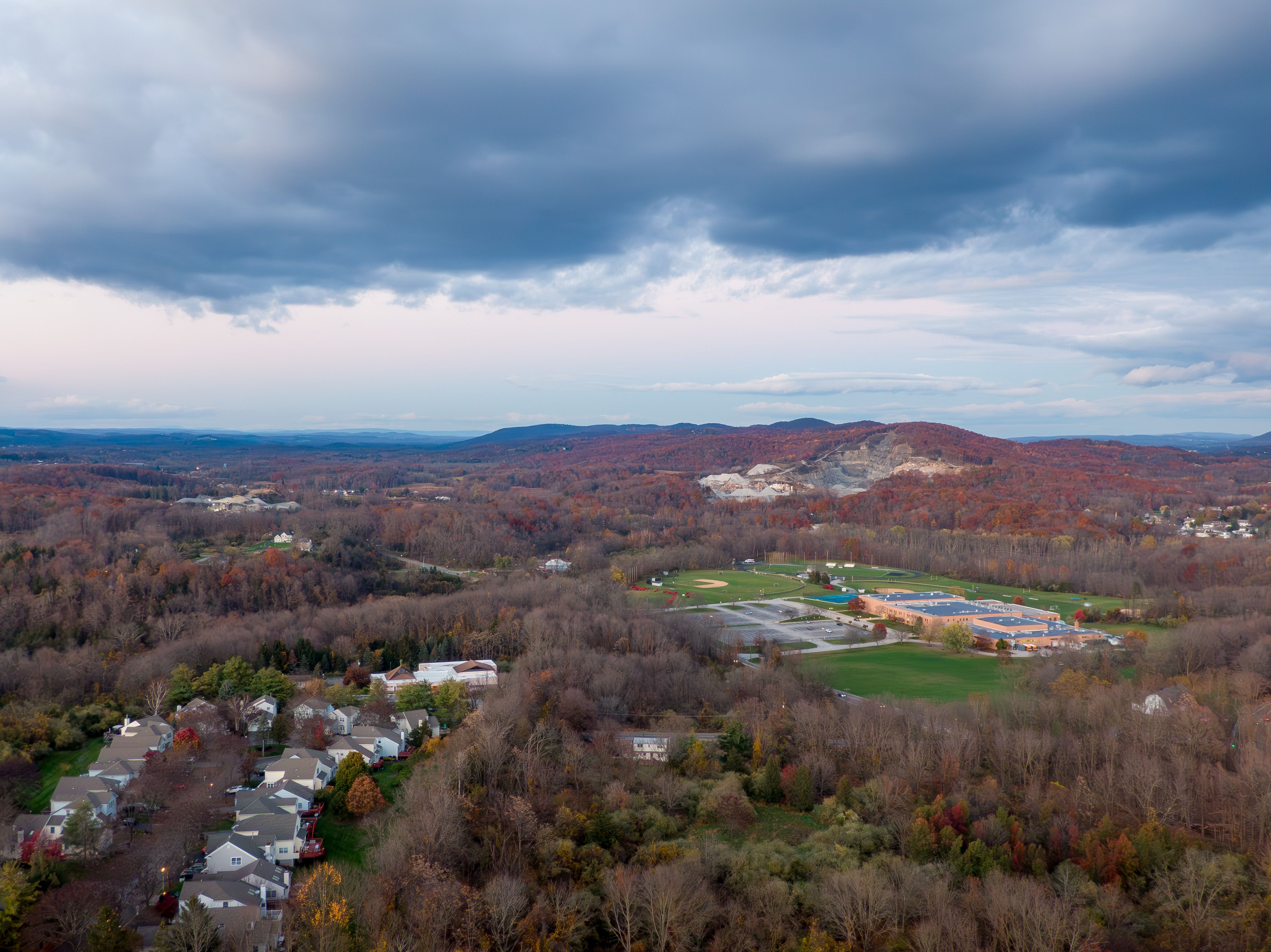 Wide aerial view of neighborhood and landscape