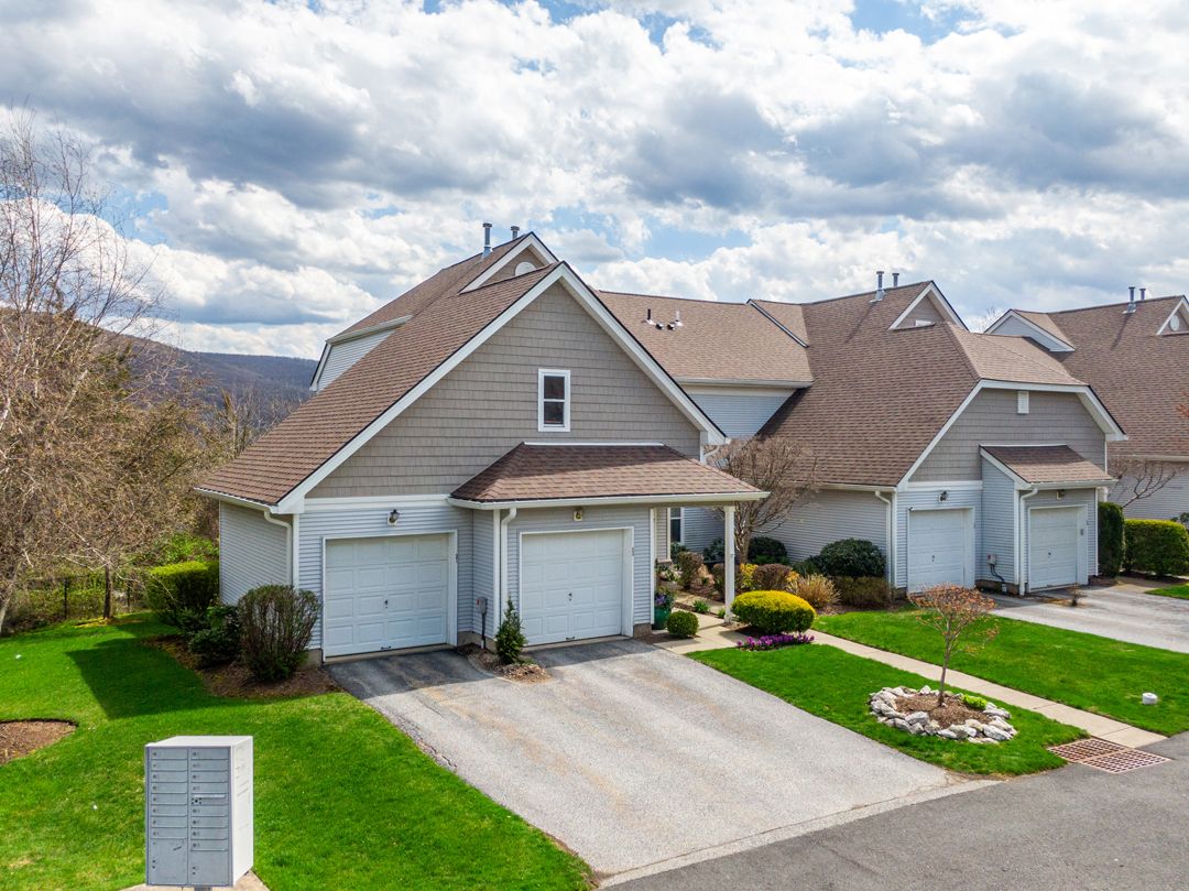 Aerial view of resort complex with parking