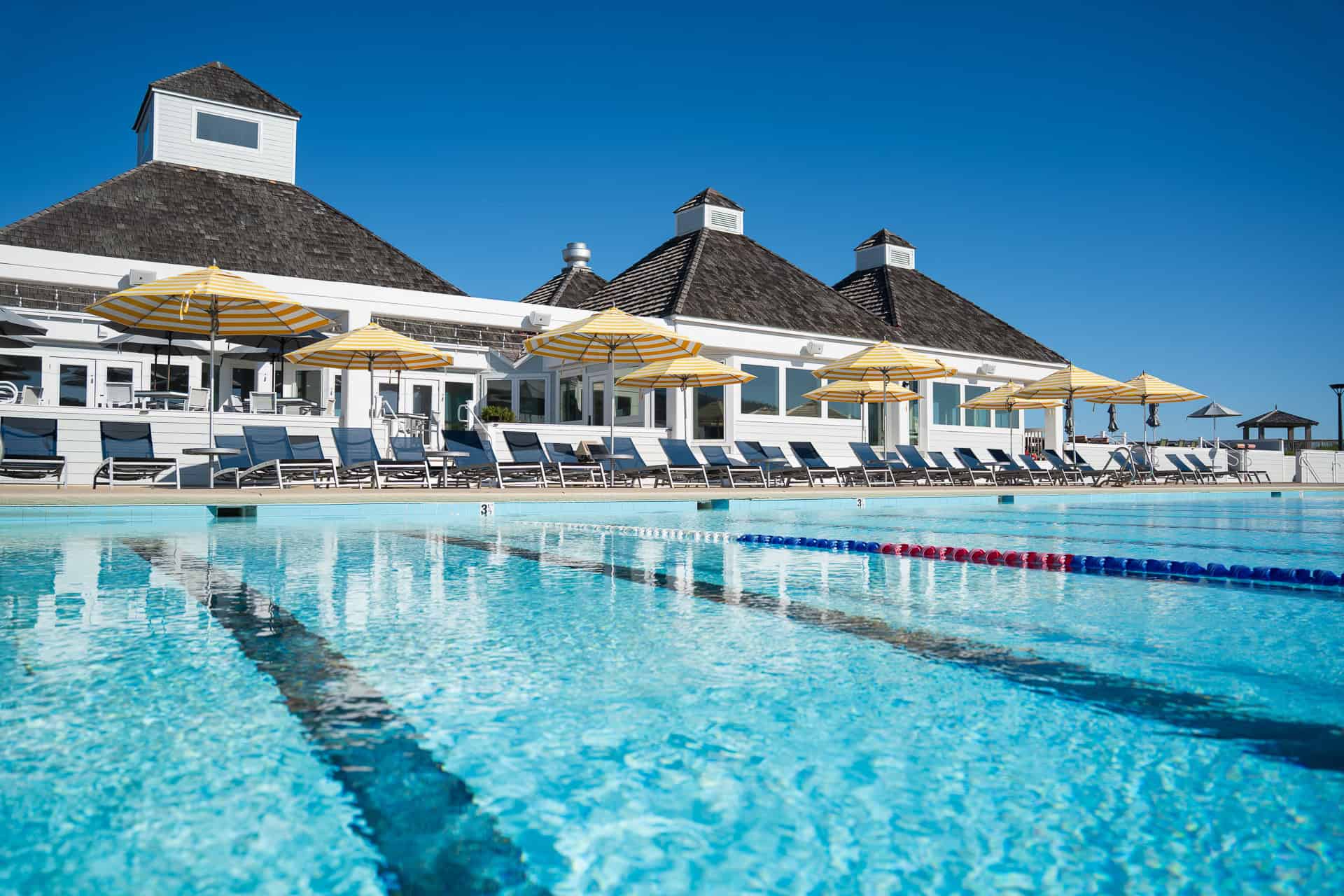 Beach club pool area with ocean access